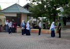 Satgas Covid-19 MTsN 1 Kota Perketat Prokes Saat Masuk Pintu Madrasah
