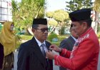 Kepala MTsN 1 Kota Gorontalo Terima Satyalancana Karya Satya 30 Tahun