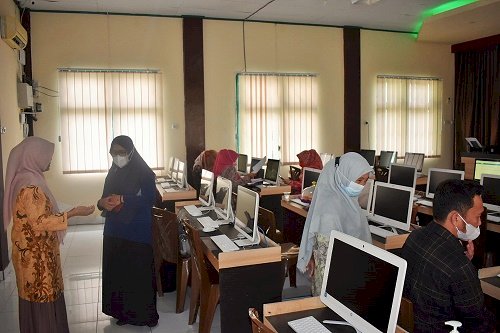 MTsN 1 Kota Terima Kunjungan Tim Monev Kanwil Terkait Penerapan eRKAM pada Madrasah Negeri